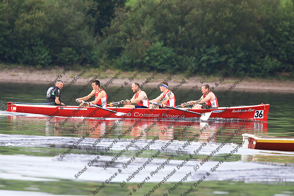 6910
